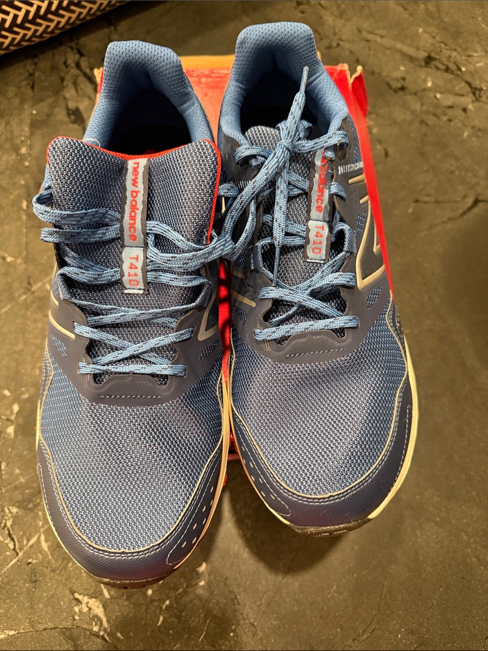 New Balance Men’s T410 Blue Athletic Sneakers with Red Accents